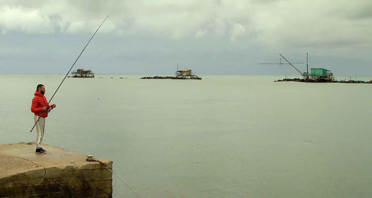 Pescatore a Bocca d'Arno