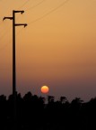 Tramonto fra i tralicci Tramonto fra i tralicci