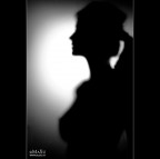 Behind...a woman. Behind...a woman.