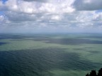 strano mare, il colore dell'acqua  dovuta alla mareggiata le chiazze ovviamente dalle nuvole, foto nulla ma il soggetto  particolare ed ho voluto fotografarlo