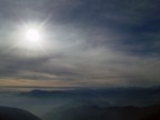 Fotografia scattata a dalla cima del Monte Croce a Nord del Lago dOrta, mi sono lasciato attrarre dal gioco di luce che si creava tra il sole e la foschia che cominciava a salire tra le montagne.

Dati di scatto:
Fotocamera		Fujifilm Finepix F700
Lunghezza focale	7,7mm
Diaframma		f8
Tempi			1/2000
Sensore		6,03 Mpixel
Sensibilit		160 ISO
Note			Correzione dei colori e il contrasto generale.