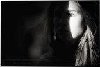 The shadow on her face...