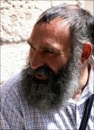 Ritratto di un mendicante Rom + 1 BN Ritratto di un mendicante Rom + 1 BN