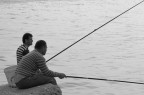 Pescatori su frangiflutto Pescatori su frangiflutto