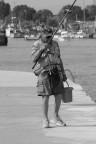 Un pescatore,in riva al molo Un pescatore,in riva al molo