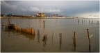 Foce dello scolmatore dell'Arno al Calambrone; sullo sfondo, attrezzature portuali di Livorno. 26/2/2014 ore 16:39:04, coord. punto di scatto 43 35' 2.32'' N, 10 18' 3.03'' E.