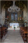 Interno della chiesa di Santa Maria Assunta a Castelluccio di Norcia - Mano semilibera (in appoggio sui ferri della cancellata) - 4/7/2014 ore 10:50