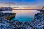 La vecchia Tonnara della baia di Santa Panagia a Siracusa , la vecchia fabbrica del tonno che cede il posto alle nuove fabbriche delle raffinerie di petrolio.