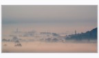 Prima luce sulla pianura nebbiosa Prima luce sulla pianura nebbiosa