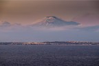 L'Etna vista dall'antica tonnara di Siracusa. All'orizzonte la citt di Augusta e subito dietro, appena accennata,  quella di Catania