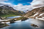 Splendido panorama che si ammira dal Colle del Nivolet con l'omonimo lago e sullo sfondo la Grivola  mt.3969 (gruppo del Gran Paradiso).