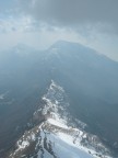 Da quota 2650 sopra il M.te Cornetto nel basso Trentino, in volo in parapendio. Sullo sfondo il monte Stivo e pi a sinistra il Biaena. Questa  per te IVO...)))